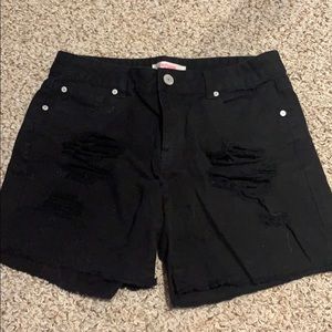 Black distressed shorts